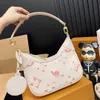 Bolsa de designer de alta qualidade Bolsa feminina crossbody elegante luxo croissant clássico flores antigas revestida de lona bolsa de corrente de couro bolsa de axilas bolsa crossbody