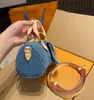 Bolsos de flores para mujer de mezclilla Speddy Pillower Top Hasndle Totes Correa extraíble Hombro cruzado Mini bolsos de vaquero azul Sacoche al aire libre Bolsillo de diseñador 17x10 cm