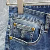 jeans da uomo di fascia alta firmati Jeans da uomo moda donna lettere verdi pantaloni grafici ricamati pantaloni classici larghi in vitello