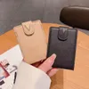 Svart präglad designer handväska läder plånböcker mini plånbok korthållare mynt handväska kvinnokorthållare nyckelring kredit lyx designer grossist små plånbok 1007