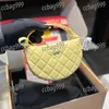 Sac de maquillage de créateur pour femmes à main ronde 1 cm matériel doré pochette de soirée de luxe en cuir diamant sac à main à carreaux sac à main vintage porte-monnaie emblème shopping pochette à clés