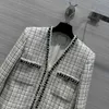 Женские куртки дизайнерские ранняя весна 2024 твидовый жакет в клетку с V-образным вырезом, легким ароматом и элегантным темпераментом, два топа-кардигана UU7O