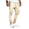 Pantaloni da uomo moda slim colore puro pantaloni sportivi fasciatura casual pantaloni con coulisse pantaloni larghi streetwear all'aperto