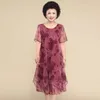 Lässige Kleider Plus Size Partykleid Frauen Midi Blumendruck Mutter mit doppelten Schichten unregelmäßigem Saum Rundhalsausschnitt für
