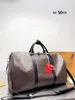 Duffel Çanta Tasarımcı Çanta Tote Çanta Lüks Seyahat Çantası Duffle Bag Erkek ve Kadın 50 cm Moda Seyahat Çantası Büyük Baskılı Lüks Baskı Kaplı Çanta Biniş Torba Çanta