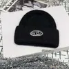 Stickad hatt, mångsidig för barn på hösten och vintern, D-label stickad hatt, varm för shopping på vintern, ullhatt, lös passande pullover hatttrend