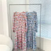 Kvinnors avslappnade klänningar Designer Spring V Neck Long Sleeve Dress Silk Digital Printing and Elegant Temperament High-End mångsidig klänning med bälte