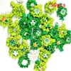 Vêtements pour chiens 30 / 50pcs St. Patrick's Day Pinces à cheveux pour animaux de compagnie Fleurs Style Épingles à cheveux Produits de toilettage mignons Accessoires pour cheveux de chiot