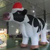 Vaca leiteira holandesa inflável gigante personalizada para atividades ao ar livre para publicidade