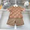 Neue Kinder-T-Shirts, Baby-Trainingsanzüge mit aufgesticktem Logo, Größe 100–150, Sommer-Revers-Polo-T-Shirt und Shorts mit Gitterdruck, 20. Januar