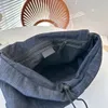 Projektant torby z torbą podróżną dżinsową torbę na ramię unisex torby luksusowe torby na lotnisku płócienne tkanina o dużej torebce 41 cm