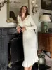 女性用のカジュアルドレスニットフリルセータードレス
