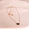 Designer Kendrascott Jewelry Elisa K Temperament elliptiskt svart glashalsband Kvinnesmycken Fashion Pink Crystal Stone Lock Bone Chain 1985