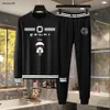 marque femmes et hommes designer deux pièces ensemble mode lettre impression dessin animé motif col rond manches longues pull + haute qualité garçon pantalon décontracté 30 janvier