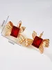 Boucles d'oreilles pendantes à Clip pour femmes, accessoires de fête, tendance papillon de styliste, couleur or 18 carats, bijoux suspendus, cadeau