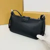 El bolso de mano Bolso de hombro de diseñador Bolso de lujo Bolsos de cuero para mujer Moda Color sólido Bolso de diseñador de tamaño pequeño Bolso Cartera de alta calidad Bolso de mano 10A