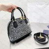 Designer väskor högkvalitativa skalväska kvinnor läder handväskor diamant axel väskor designer handväska crossbody handväska tygväska2412