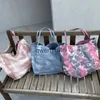 Borse a tracolla Borse a tracolla di grande capacità stile preppy per le donne Borse di design e borsa di lusso 2023 Nuovo in tela Tie-Dye Process Clot Soppingqwertyui45