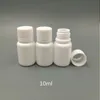 100pcs 10ml 10cc 10g小さなプラスチック容器シールキャップのふたが付いたピルボトル、空の白い丸いプラスチックピル薬ボトルxsmbu omlev