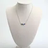 Ontwerper Kendras Scotts Sieraden Dagelijkse sieraden Klimop Minimalistisch en nauwgezet Pauwsteen Delicate korte ketting met sleutelbeenketting