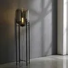 Lampy podłogowe postmodernistyczne kreatywne proste badanie projektanta biały melon przezroczysty światło szklane lampa podłogowa nordycka sypialnia sypialnia lampa hotelowa YQ240130