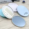 Bärbar makeupspegel med liten kombination av kombination spegelkam set makeup kam huvud bärbar spegel vikning elliptisk spegel