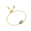 Designer Kendras Scotts Schmuck Elaina Schlichtes, verkupfertes, echtes Gold, lila, lilafarbenes Abalone-Muschel-Kettenarmband mit geometrischem Schnitt, Zugarmband