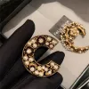 Broche de perlas con incrustaciones de latón Vintage para mujer, abrigo ligero de lujo de gama alta con flores en el pecho, suéter, tendencia, novedad de 2024