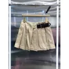 2024 sommer Neue Akademie Stil Bund Dekoration Plissee Kleid Unregelmäßigen Niedrigen Taille Lässige Mode A-linie Kurzen Rock