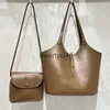 Sacs à bandoulière Sacs seau de grande capacité pour femmes Designer de luxe et sacs et sacs à main 2023 nouveau en PU huile cire serrure avec poche intérieure Soulderqwertyui45