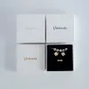 Stränge benutzerdefinierte Logo 50pcs Schmuck Organizer Box Schwarz weiß Kraftpapier Geschenkboxen Verlobungsring für Ohrring -Halskettenarmband