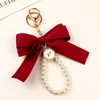 Keychains Cute Large Bow Faux Pearl Lanyard Key Chain For Women Girls Bag Earphone Case Hanging Chains Keyring Jewelry