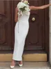 Mode sexig båge stropplösa klänningar kvinnor vit midi klänning backless ärmlös kroppskon kvinnlig chic festklubbrockar 24030