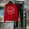 Designer hoodie män märke kläder för mens våren tracksuit mode cirkulär logotyp tryck långärmad man två bit set student byxor 30 jan