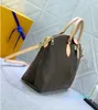 2024 Axel 2 storlekar Kvinnors väskor Designer Laptop 13 Inch Bag Gold Lock Luxury Brand