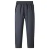 Plus rozmiar 6xl 7xl 8xl Zimowe spodnie polarowe męskie gęste ciepłe swobodne dresowe dresowe spodnie mody sznurka do joggingu spodnie 240124