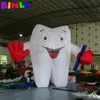 Dent gonflable géante artificielle personnalisée avec brosse à dents mené un homme dentaire blanc ballon pour la promotion publicitaire du dentiste 4mtshigh