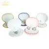 Anneaux 10pcs / lot Shell Forme Boîte de bague de fiançailles de mariage Velvet Boîte pour boucles d'oreilles Bracelet Bijoux Boîte d'affichage Boîte à cadeaux