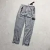 Stone Designer Pants Island Top Quality Grapestone Męskie spodnie cienki wiosna/lato metalowe nylonowe spodnie sportowe spodnie nylonowe High Street dla mężczyzn i kobiet