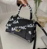 Bolsas de grife de moda pequenas mini -ampulheta Totes Mulheres Bolsas Compras Bolsas de ombro de couro PU luxuoso PU