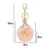 Porte-clés mode métal strass lettre avec pompon rose fausse boule de fourrure de lapin pour femmes décoration de sac à main