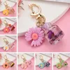 Keychains Creative Daisy Moon Buckle Wish Bottle Keychain Eternal Simulation Flower Transparent Key Ring Women Bag Pendant Gift