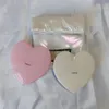 Miroirs compacts miroir de poche de maquillage à main en forme de coeur avec pochette