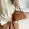 Sacos de noite Boston Bag para mulheres Designer de luxo andbags e bolsa 2023 novo em vintage falso camurça simples sul coreia bowling zíper carteirah24131