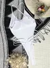 Costumi da bagno da donna Vigoashely 2024 Donne sexy con cinturino bianco Taglio alto Push UP Costume intero Monokini Croce Hollow Beach Costume da bagno