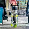 Bottiglie d'acqua Succo di frutta Bottiglia di vetro per tè Trasparente Sport Viaggio all'aria aperta Portatile a tenuta stagna 2L con cinturino