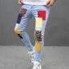 Mannen stijlvolle gepersonaliseerde patchwork potlood jeans broek hiphop mannelijke skinny jogging denim broek 240125