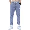 Pantalon pour hommes Jeans Automne Hiver Chauffeur chaleureux Draw-DrawString élastique Pockets de jean décontracté pantalon mâle molle décontracté