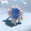 Klusterringar 2024 925 Silver Importerad högkol diamant Sea Blue Treasure 11 15mm Water Drop Embedding Pearl Ring