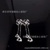 Designer Bvlgary Jewelry Precision Long Style Baojia Windmill mit Diamantquastenohrringen und vier blütenblattförmigen weiblichen Ohrringen für ein High-End-Gefühl
